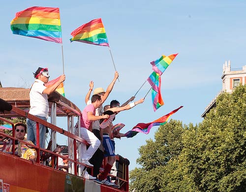 Madrid Gay Pride Bus and flags in the Madrid Gay Pride 2013